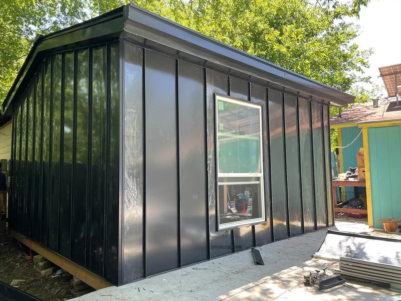 Black standing seam metal wall panels for Metal Roof Installation in Ulster